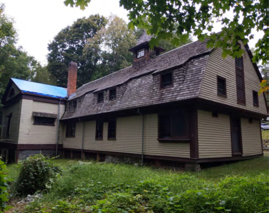 Carriage house and barn prior to restoration. Photo courtesy of Spencer Preservation Group.