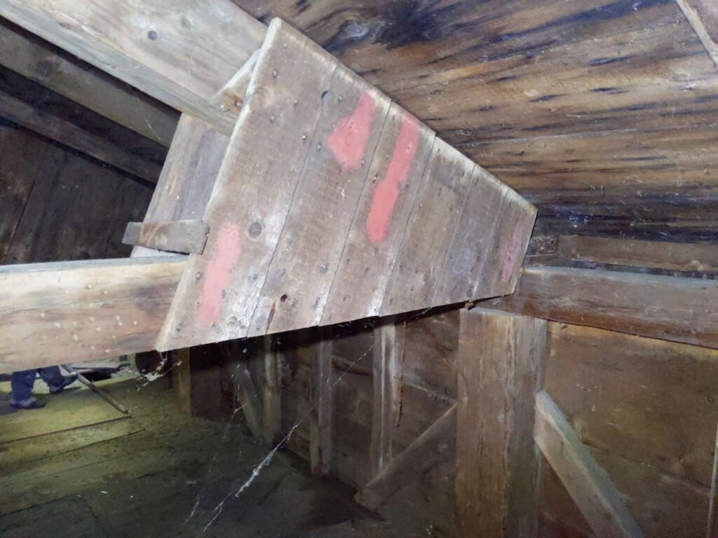 Original roof framing was overloaded, as indicated by this retro-fit attempt to reinforce the truss.